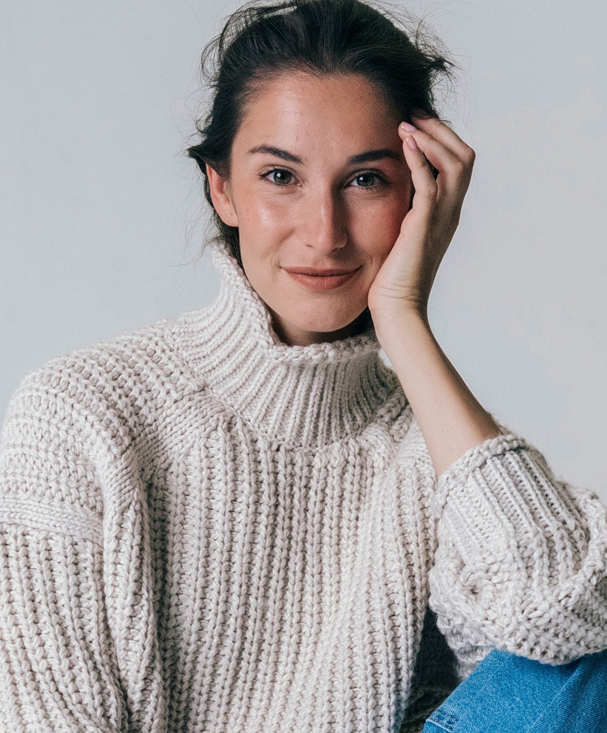 Woman in black leggings outdoors, focused on legs.