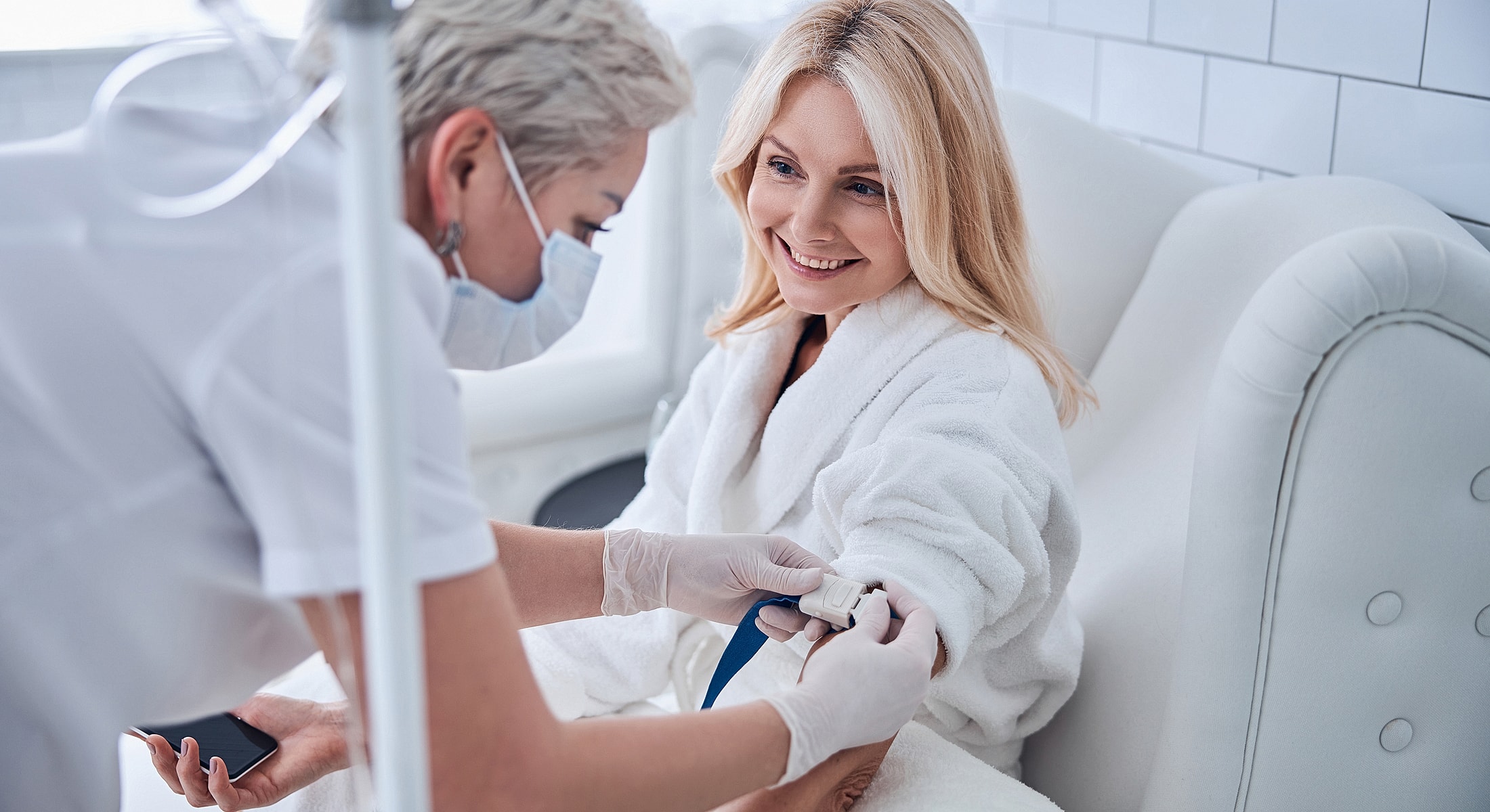 Patient receiving care from a healthcare professional.