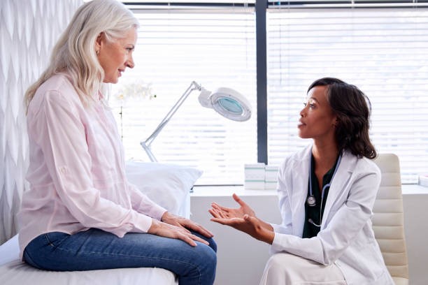 old woman consulting to a plastic surgeon for a chemical peel